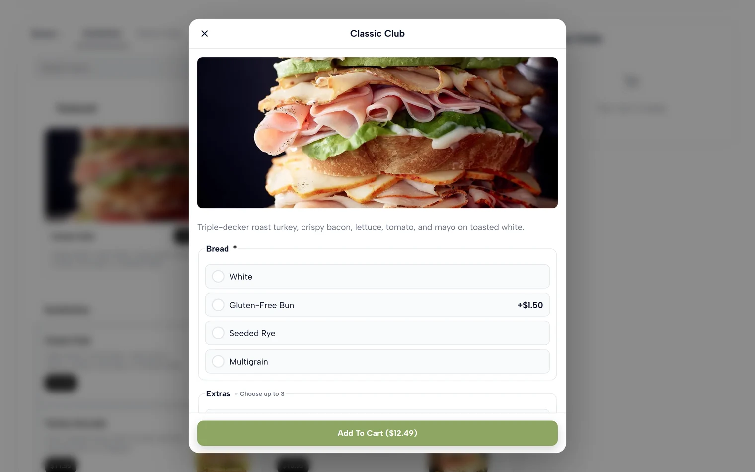 An item sheet with required Bread choices and optional Extras add-ons